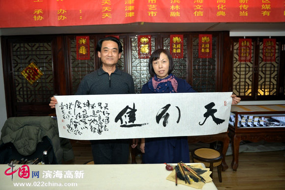 刘荣生与艺林文化传媒董事长薛芹。